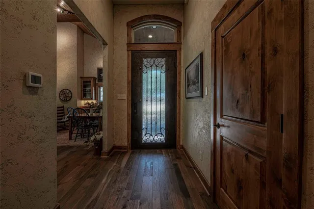 a view of gallery with wooden floor