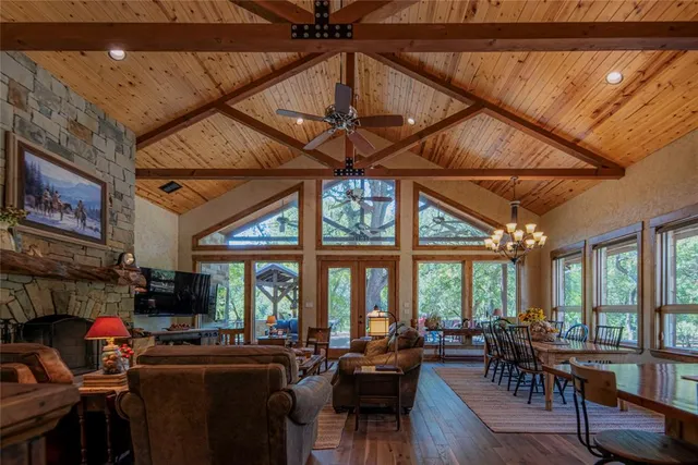 a view of a livingroom with furniture window and outside view