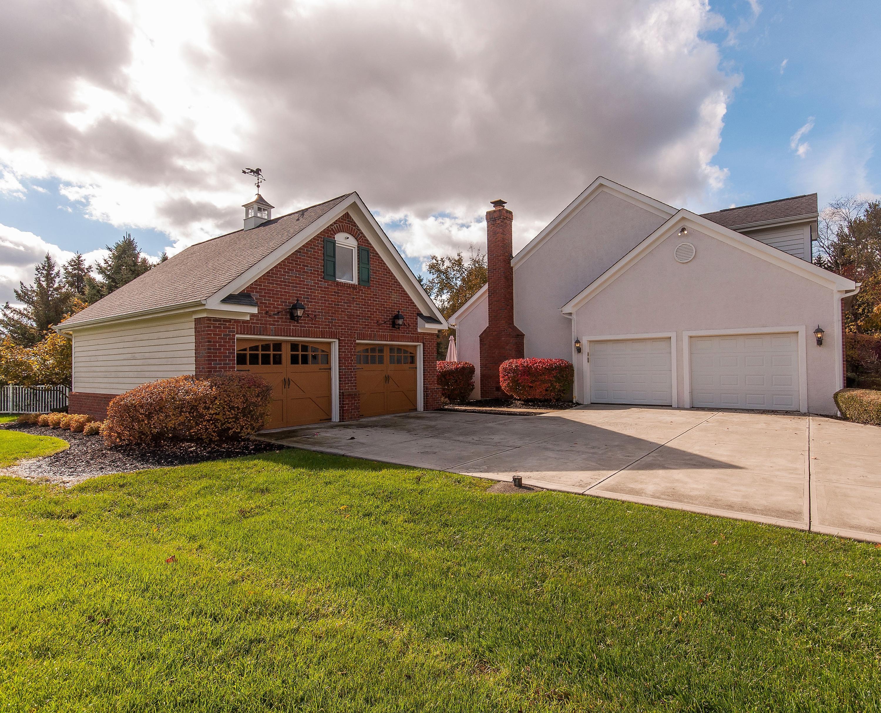 Ample parking and storage located within the 4 car garage