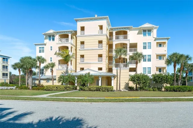 a front view of a building with a yard