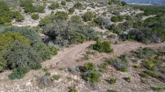 a view of a city with mountains in the background