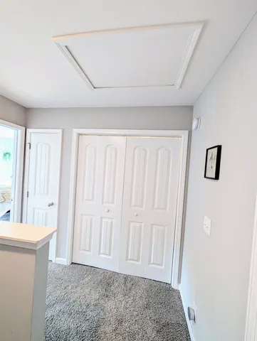 a view of room with window and hardwood floor