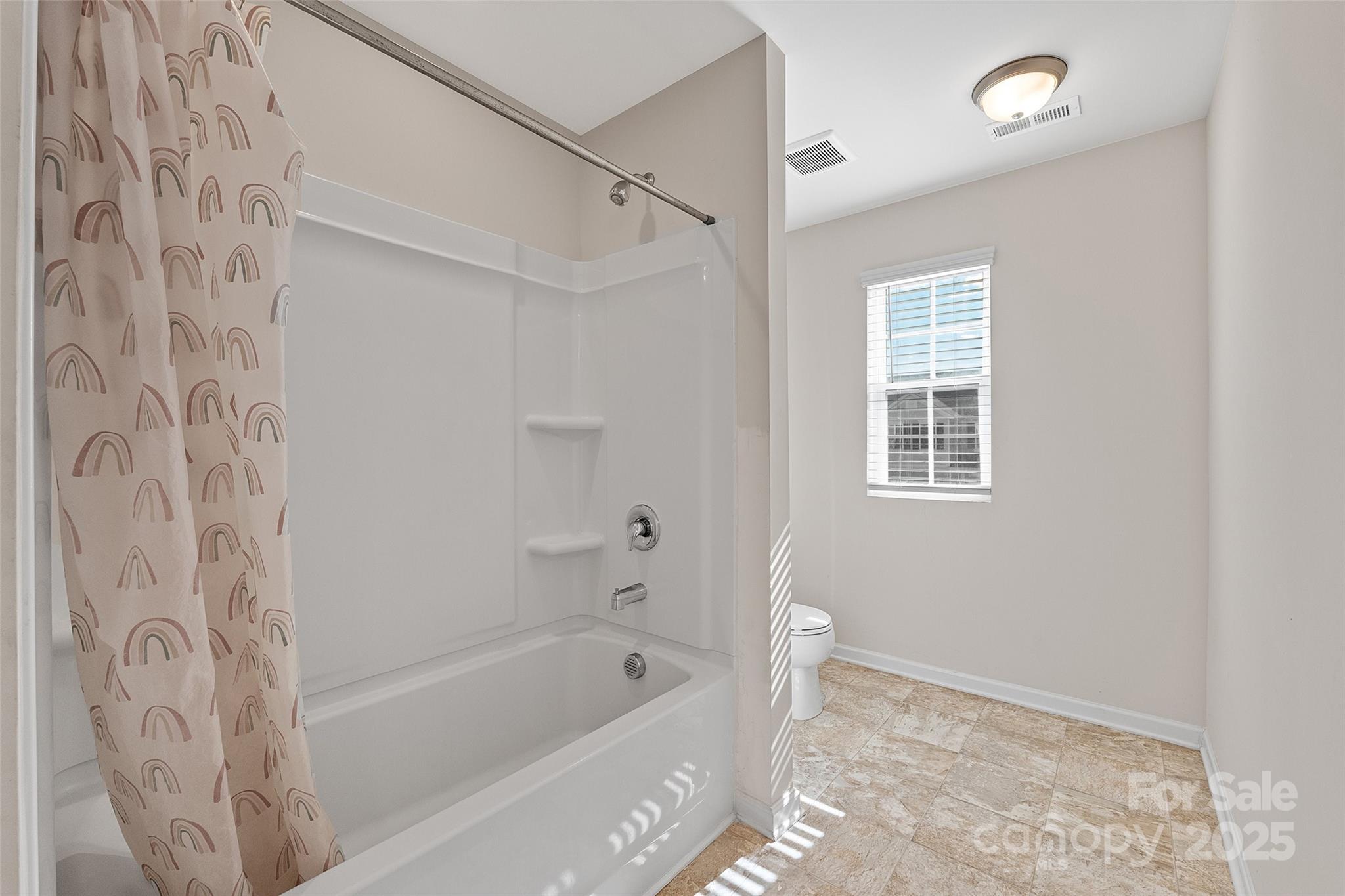 14027 Ridgewater Way Charlotte, NC 28278 - Photo 11 of 48 a bathroom with a bathtub and a shower