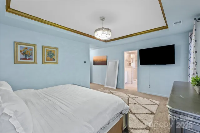 a spacious bathroom with a shower sink vanity granite and mirror