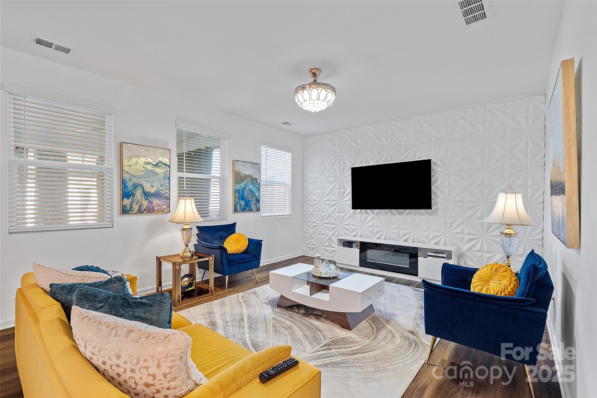 14027 Ridgewater Way Charlotte, NC 28278 - Photo 33 of 48 a living room with furniture fireplace and a flat screen tv