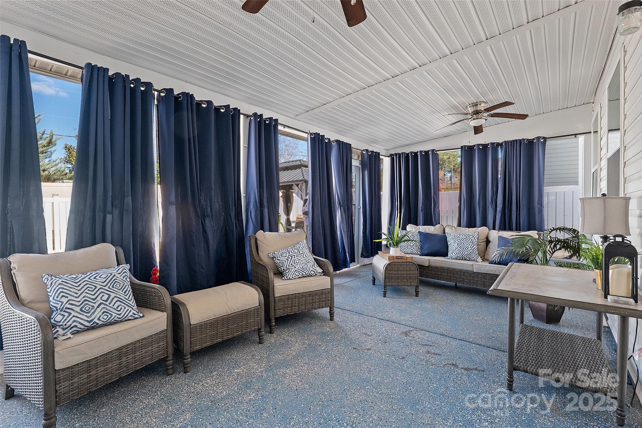14027 Ridgewater Way Charlotte, NC 28278 - Photo 38 of 48 a living room with furniture and a chandelier