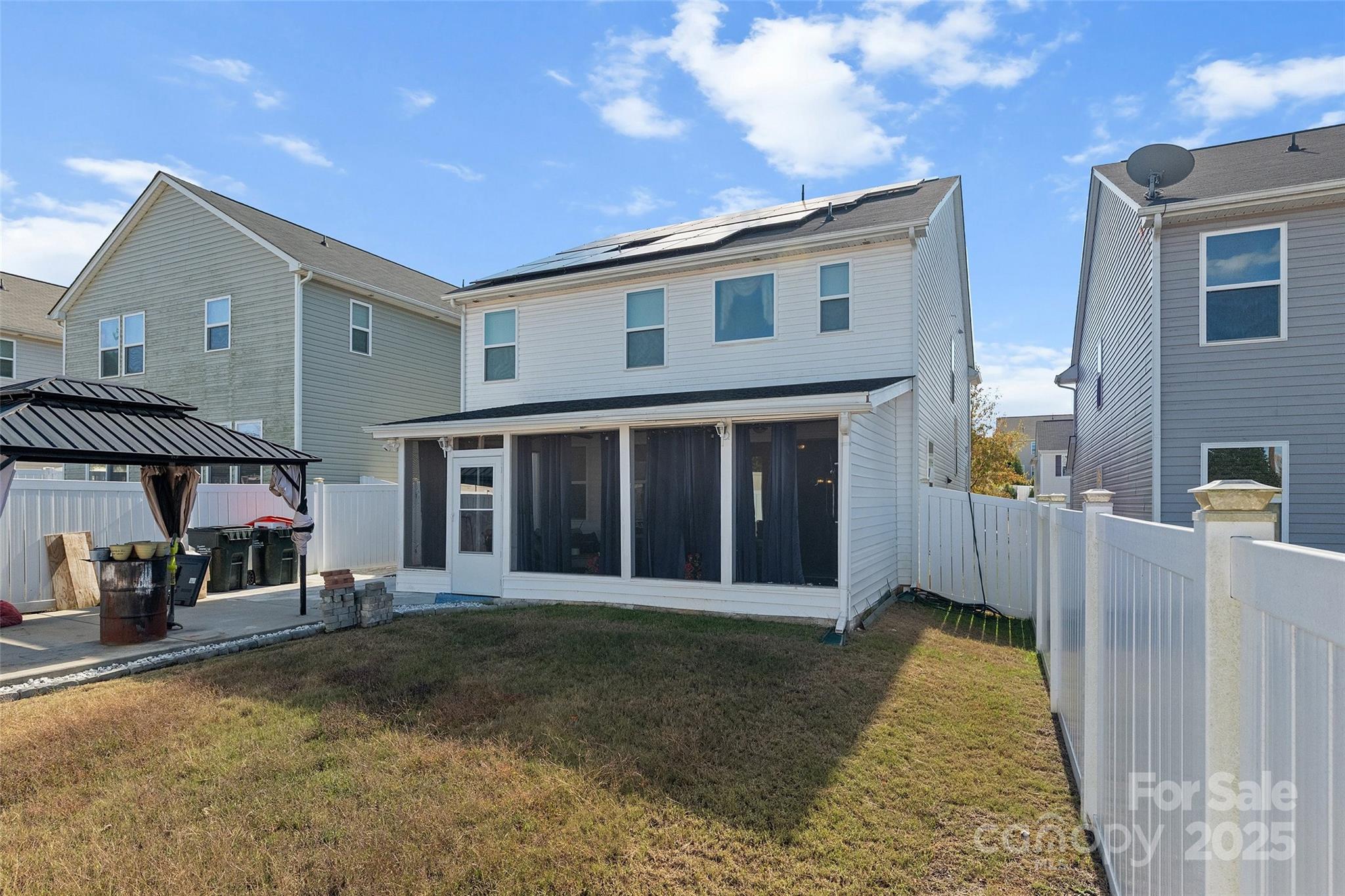 14027 Ridgewater Way Charlotte, NC 28278 - Photo 39 of 48 a view of a house with a barbeque and large trees