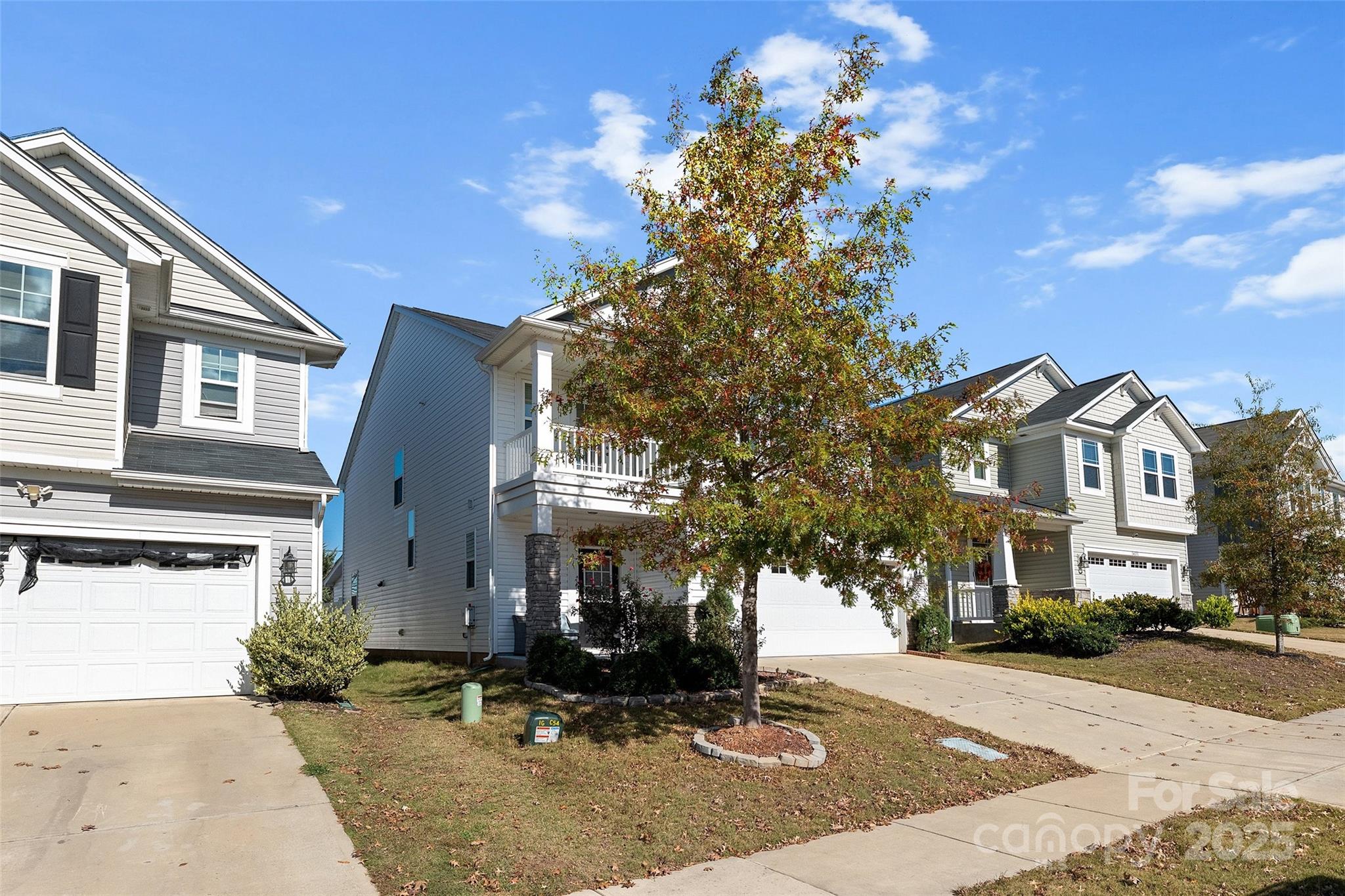 14027 Ridgewater Way Charlotte, NC 28278 - Photo 4 of 48 a front view of a house with a yard