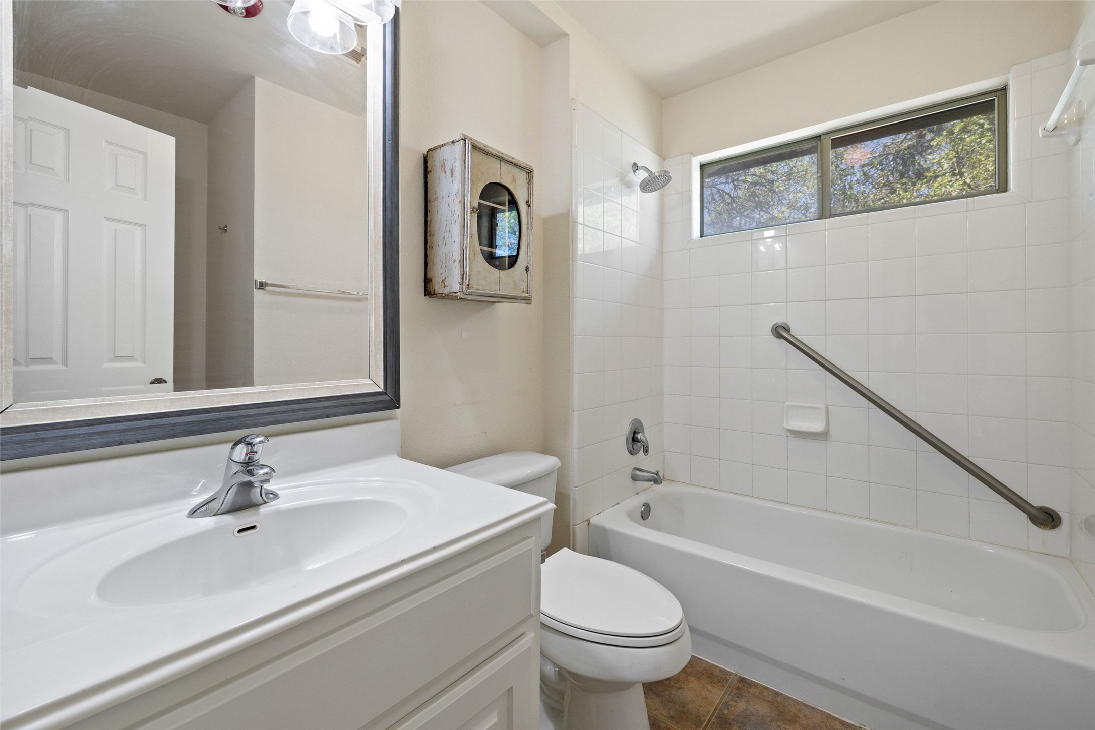 815 Elliott Ranch Road Buda, TX 78610 - Photo 17 of 40 Bathroom featuring vanity and bathtub / shower combination
