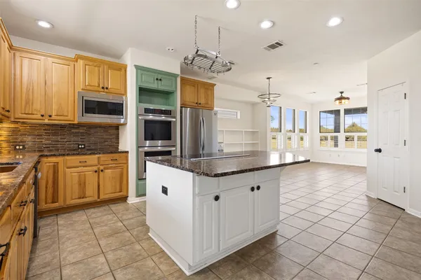 $1,299,999 | 815 Elliott Ranch Road, Buda, TX 78610