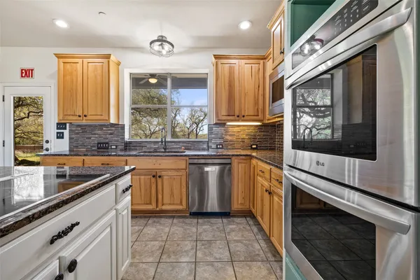 $1,299,999 | 815 Elliott Ranch Road, Buda, TX 78610