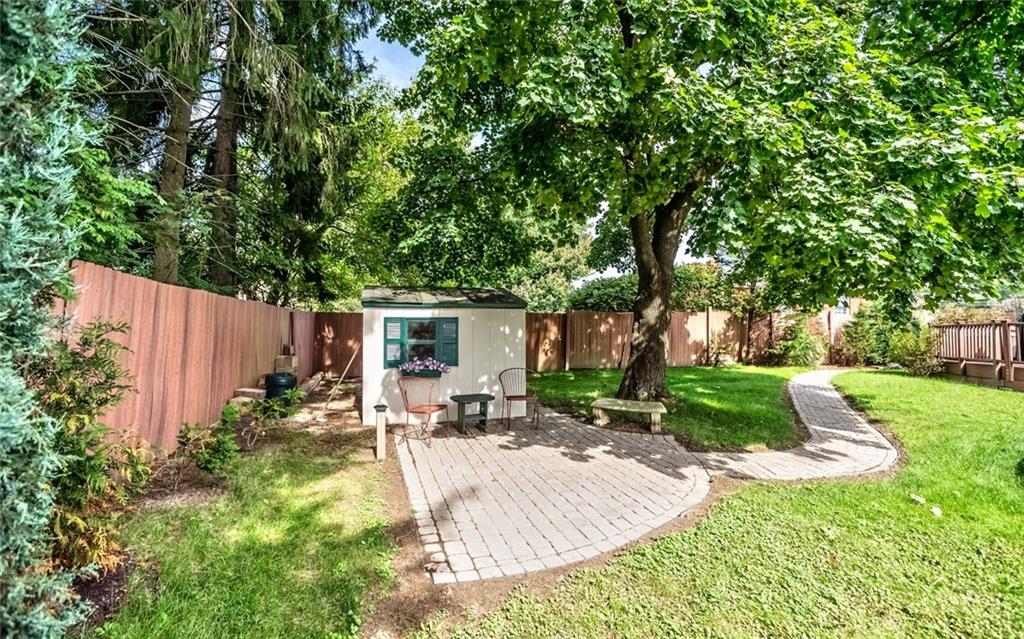 9101 Pannier Road Pittsburgh, PA 15237 - Photo 6 of 24 LEVEL Fenced rear yard with deck and omni stone patio & Utility shed.