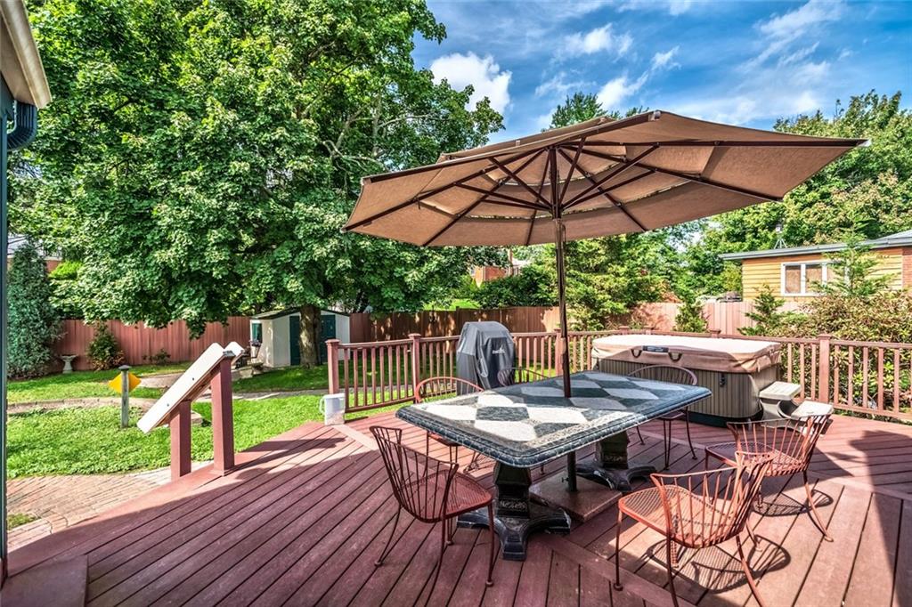 9101 Pannier Road Pittsburgh, PA 15237 - Photo 8 of 24 LEVEL Fenced rear yard with deck and omni stone patio & Utility shed.