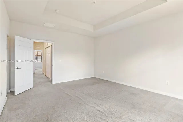 an empty room with closet area
