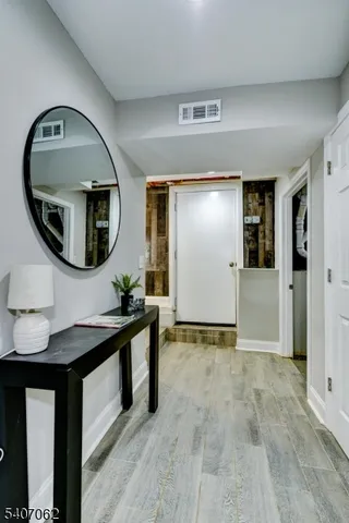 a view of a livingroom with furniture