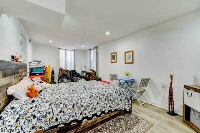 a bed room with furniture and a couch