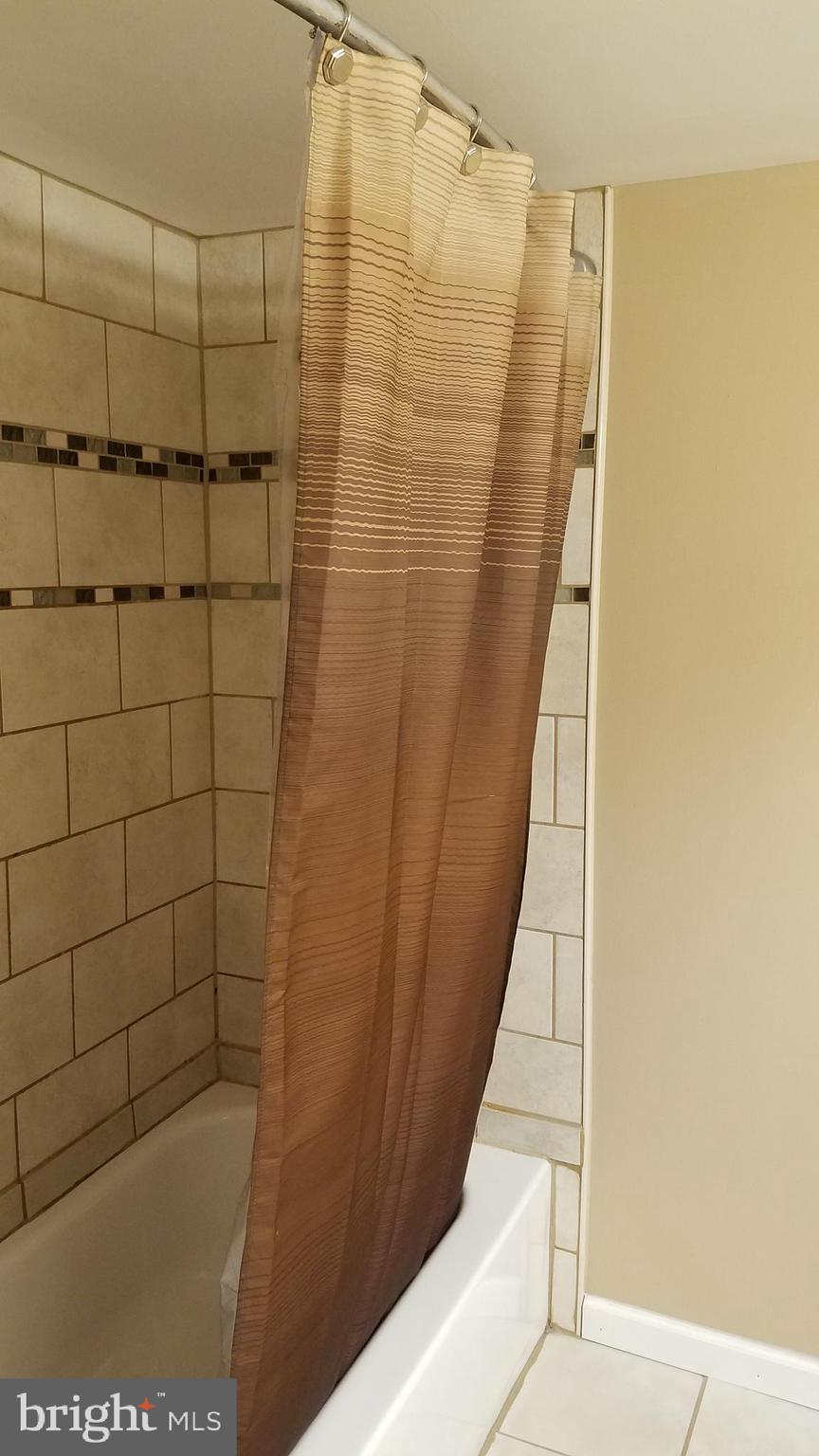 3163 Jeffland Road Baltimore, MD 21244 - Photo 18 of 25 Lower Level Tub w/ceramic tiles