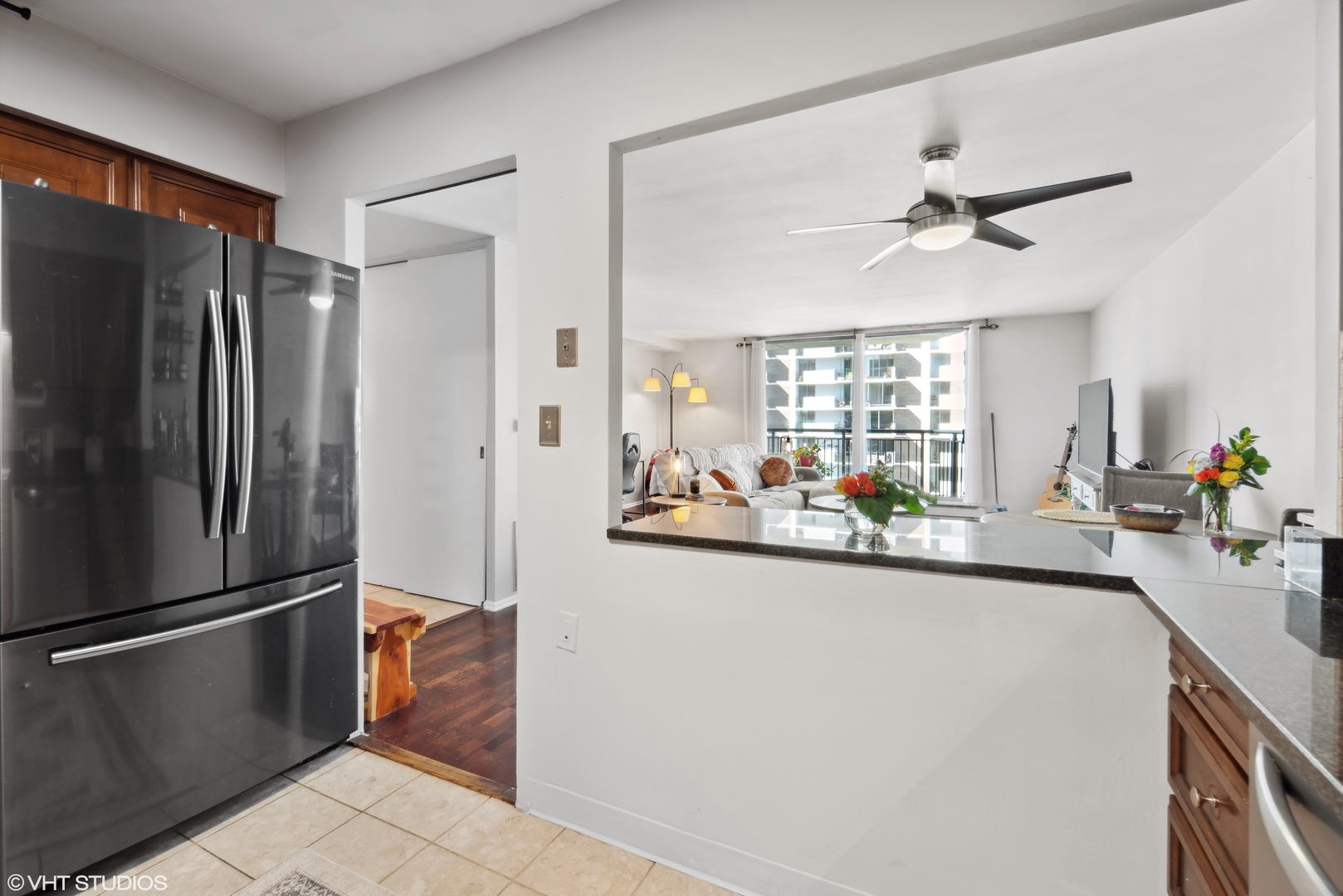 6007 North Sheridan Road, Unit 31F Chicago, IL 60660 - Photo 8 of 43 a kitchen with stainless steel appliances a refrigerator and a sink
