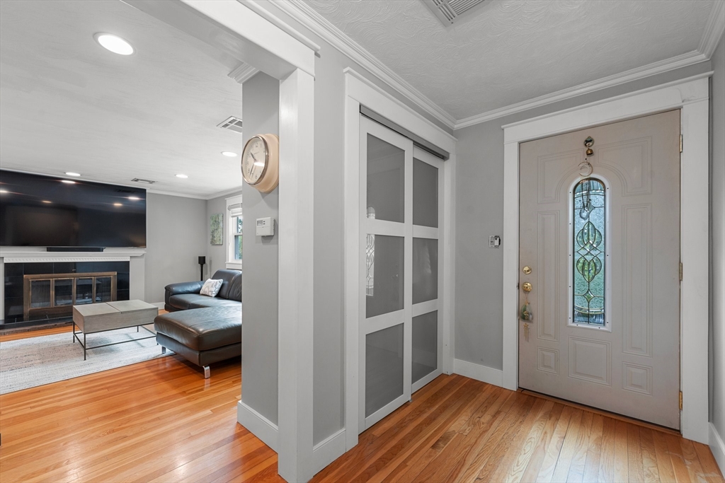 27 Lexington Road Wellesley, MA 02482 - Photo 30 of 34 a view of living room with furniture and flat screen tv