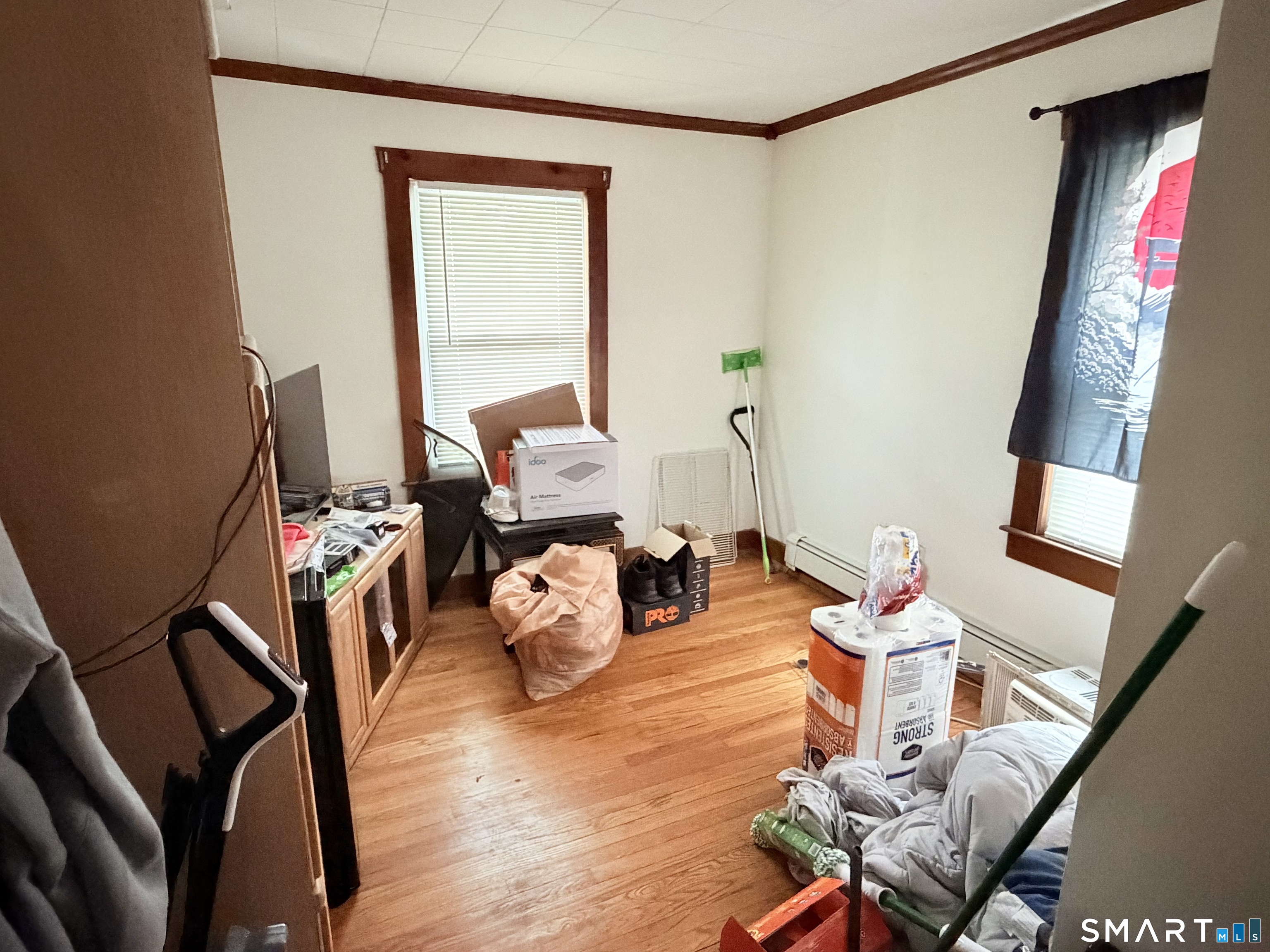 67 Pine Street Meriden, CT 06451 - Photo 20 of 34 a living room with furniture and a wooden floor