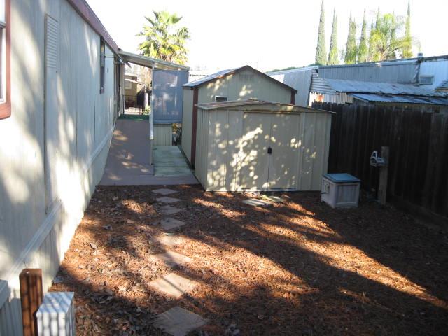 1270 Magic Sands Way Turlock, CA 95380 - Photo 24 of 25 a view of a house with a yard