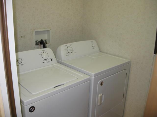 1270 Magic Sands Way Turlock, CA 95380 - Photo 10 of 25 a utility room with dryer and washer