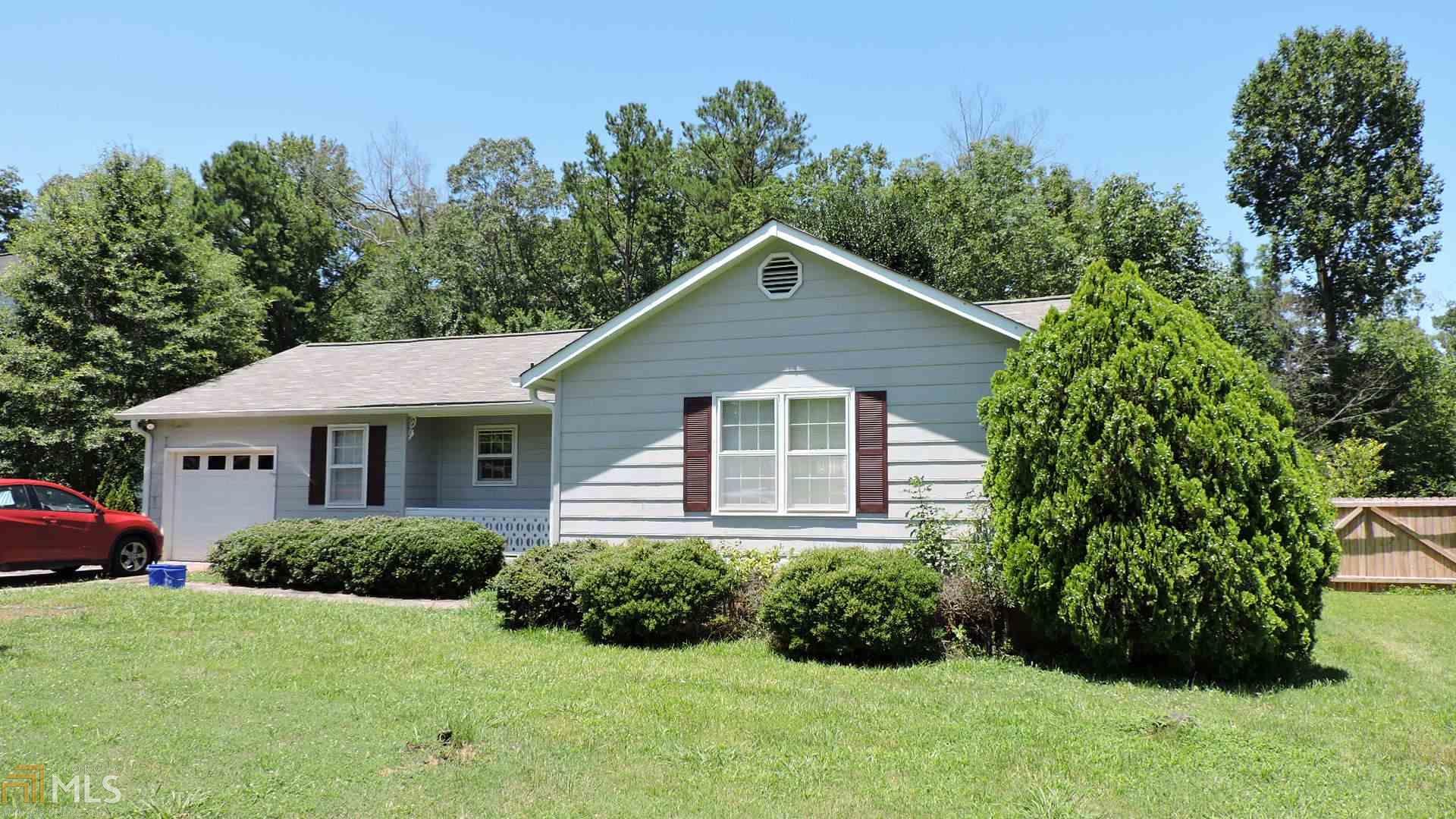 114 Leafmore Road Southwest Rome, GA 30165 - Photo 1 of 1 a front view of a house with a yard