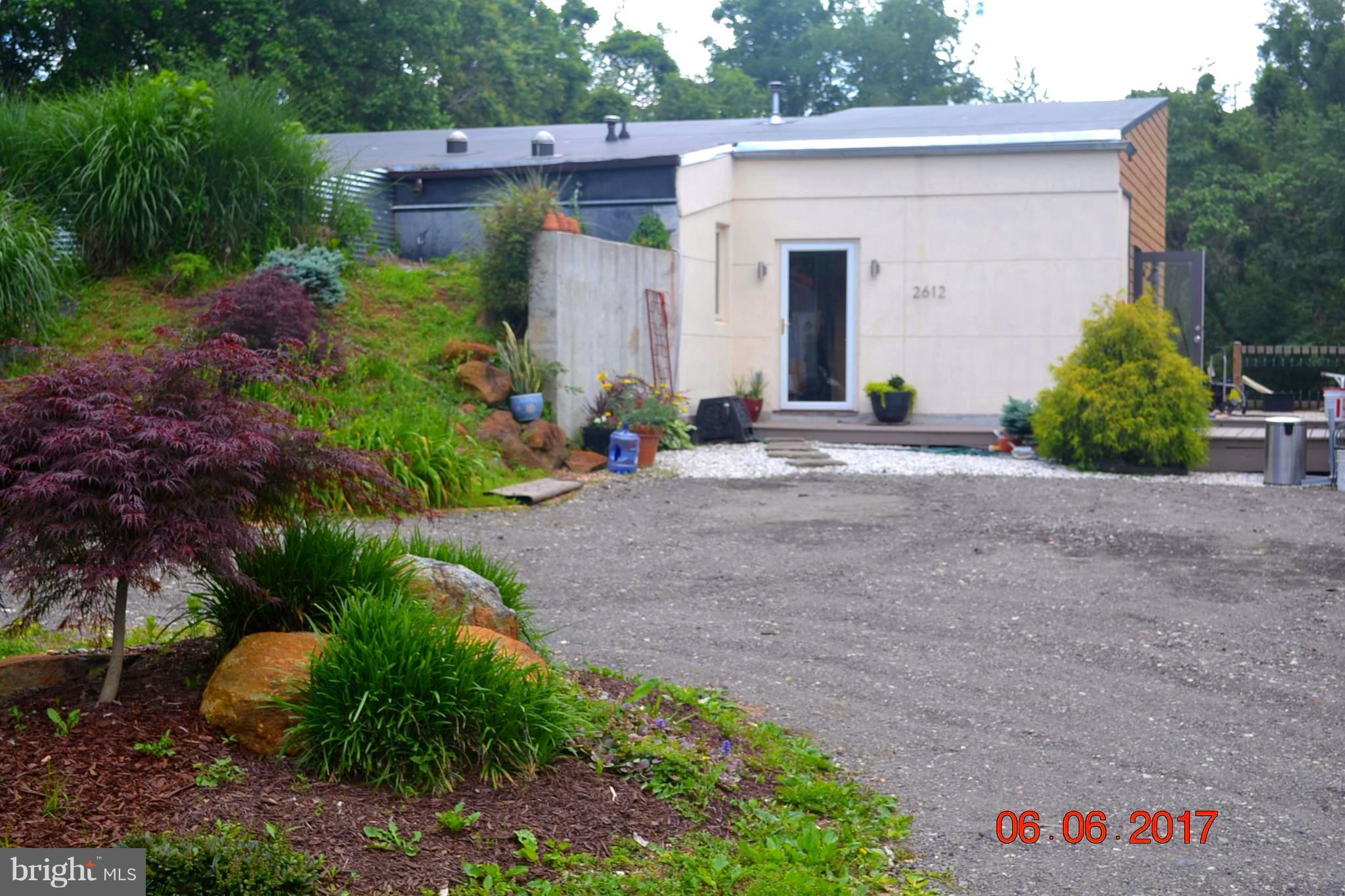 2612 Reckord Road Kingsville, MD 21087 - Photo 15 of 28 a view of a house with a yard and plants