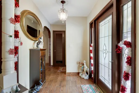 a view of a hallway with washer and dryer