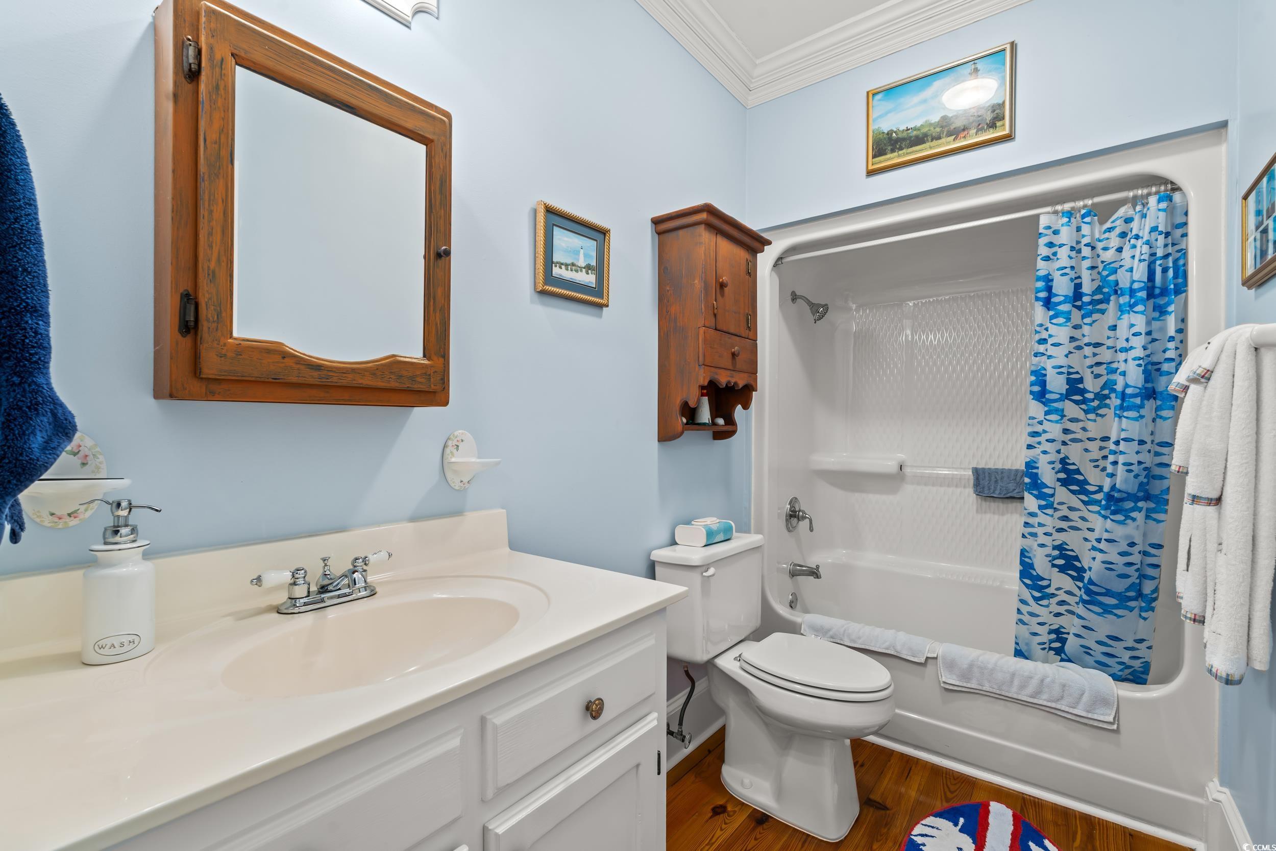 246 County Rd S-22-656 Murrells Inlet, SC 29576 - Photo 26 of 39 Full bath with vanity, crown molding, toilet, show