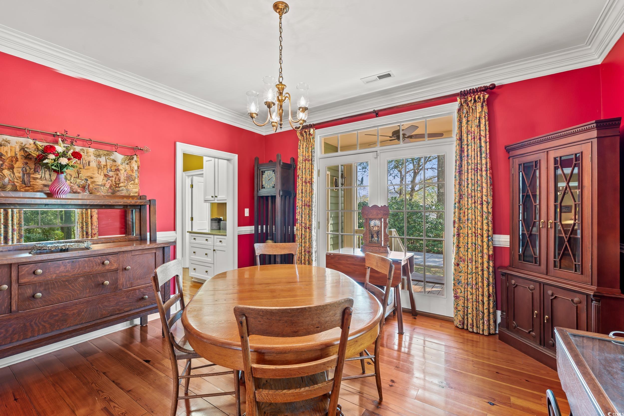246 County Rd S-22-656 Murrells Inlet, SC 29576 - Photo 10 of 39 Dining room with 100 yr old, heart pine wood floor