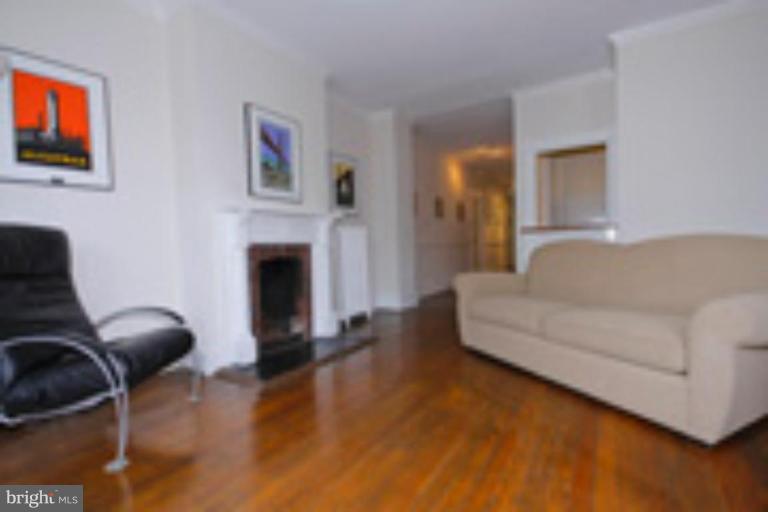 1823 Riggs Place Northwest, Unit 5 Washington, DC 20009 - Photo 3 of 5 living room with fireplace