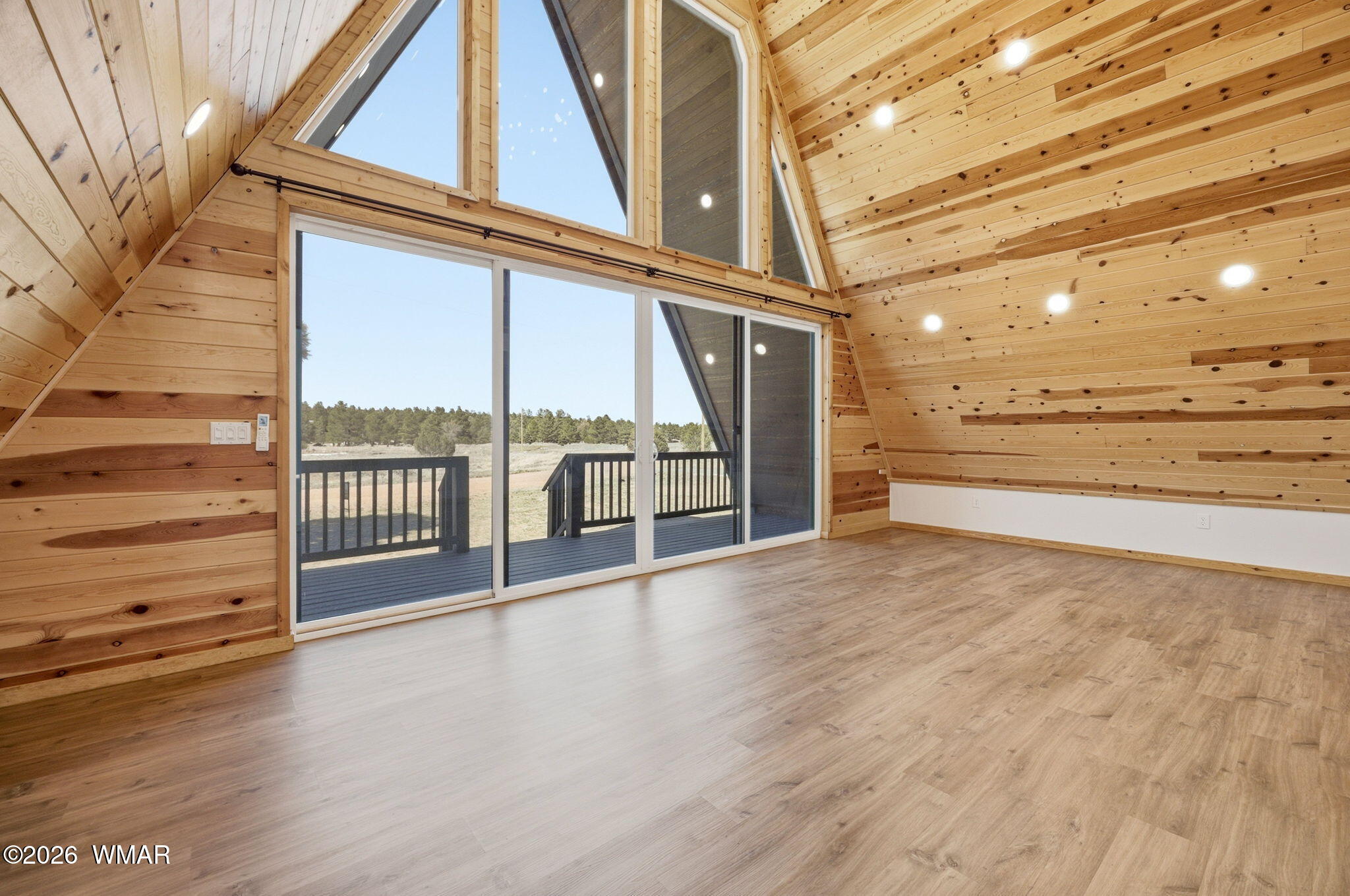 2281 Meadow Lane Overgaard, AZ 85933 - Photo 8 of 33 a view of an entryway with wooden floor
