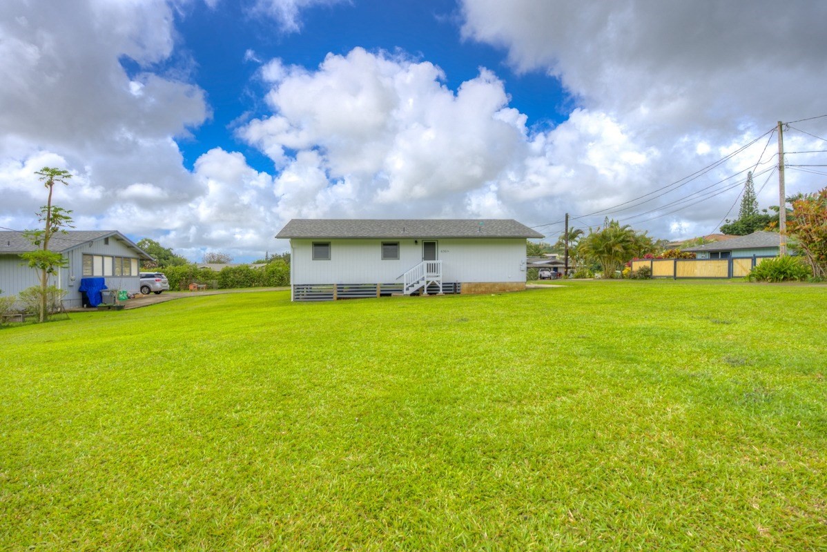 6363 A Puupilo Road Kapaa, HI 96746 - Photo 15 of 19 a view of a house with a big yard and a large tree