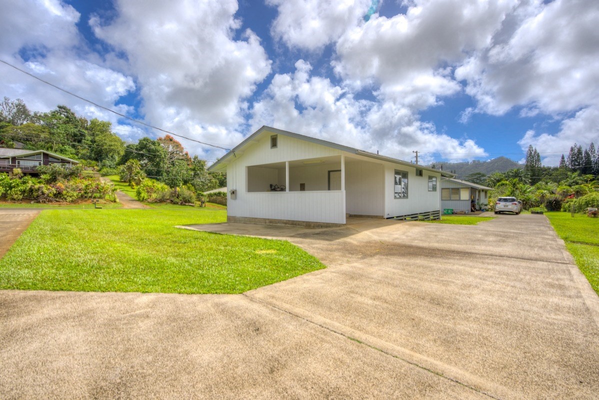6363 A Puupilo Road Kapaa, HI 96746 - Photo 2 of 19 a front view of a house with garden