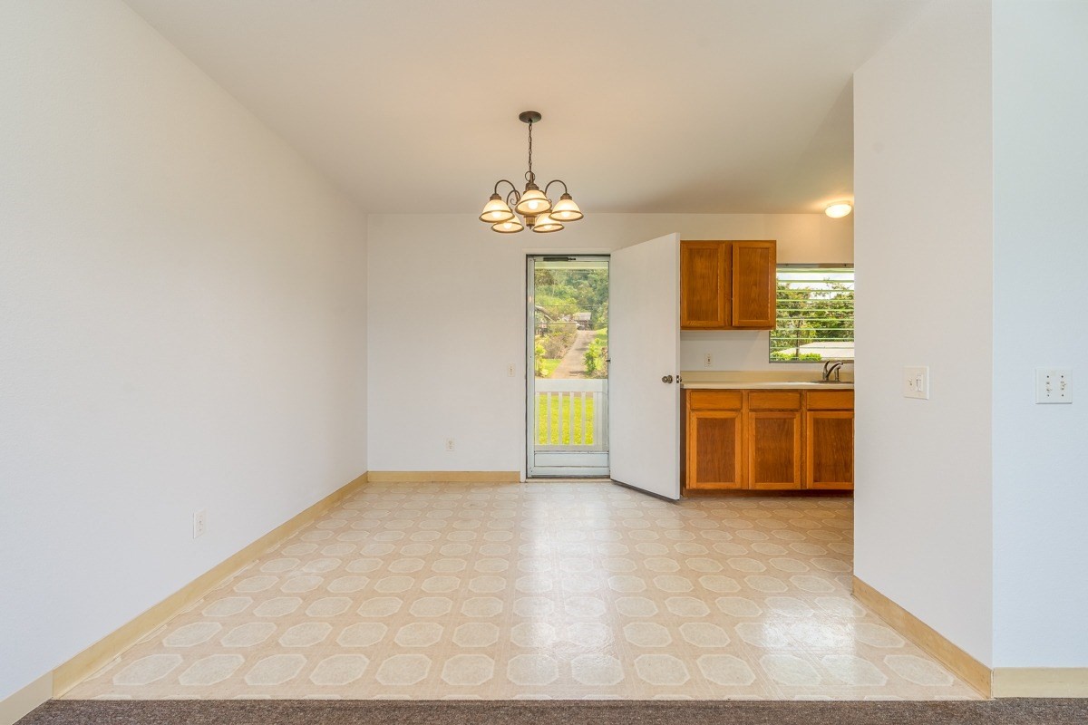6363 A Puupilo Road Kapaa, HI 96746 - Photo 7 of 19 a view of a kitchen with a sink cabinet and a window