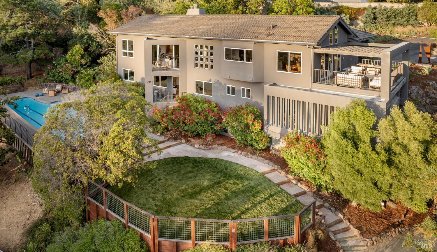 31 Montecito Road San Rafael, CA 94901 - Photo 1 of 1 a aerial view of a house with a yard and potted plants