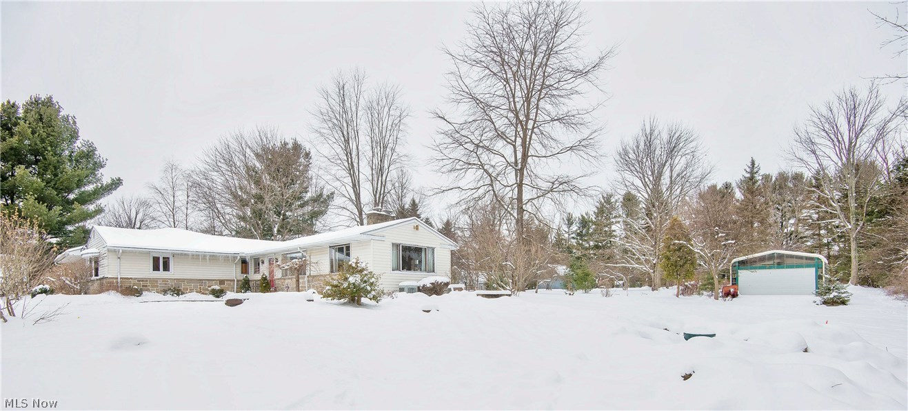 7844 Kinsman Road Novelty, OH 44072 - Photo 24 of 27 Front view of the property with out building.