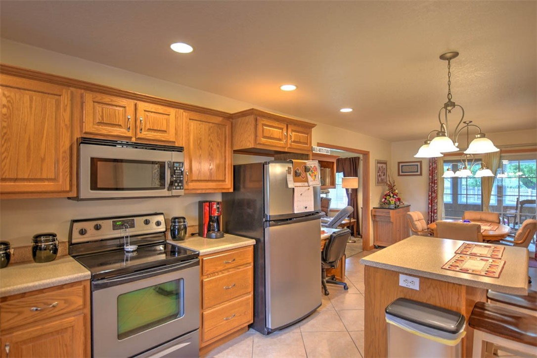 2008 St Louis Bridge Road Decatur, IL 62521 - Photo 17 of 36 a kitchen with a stove a refrigerator and a sink