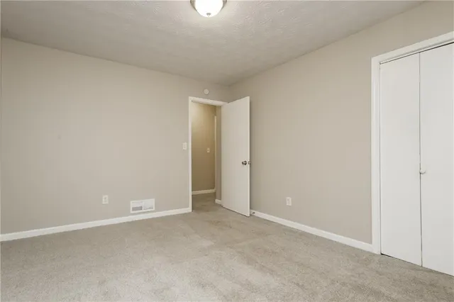 an empty room with an entryway
