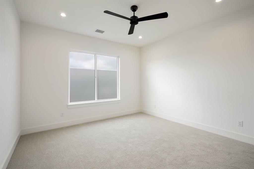3316 Ferguson Road Grapevine, TX 76092 - Photo 29 of 39 an empty room with a window and a fan