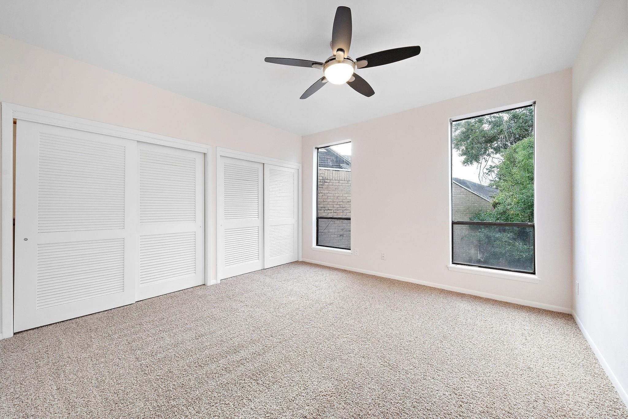 1111 Potomac Drive, Unit B Houston, TX 77057 - Photo 19 of 22 a view of an empty room with a window