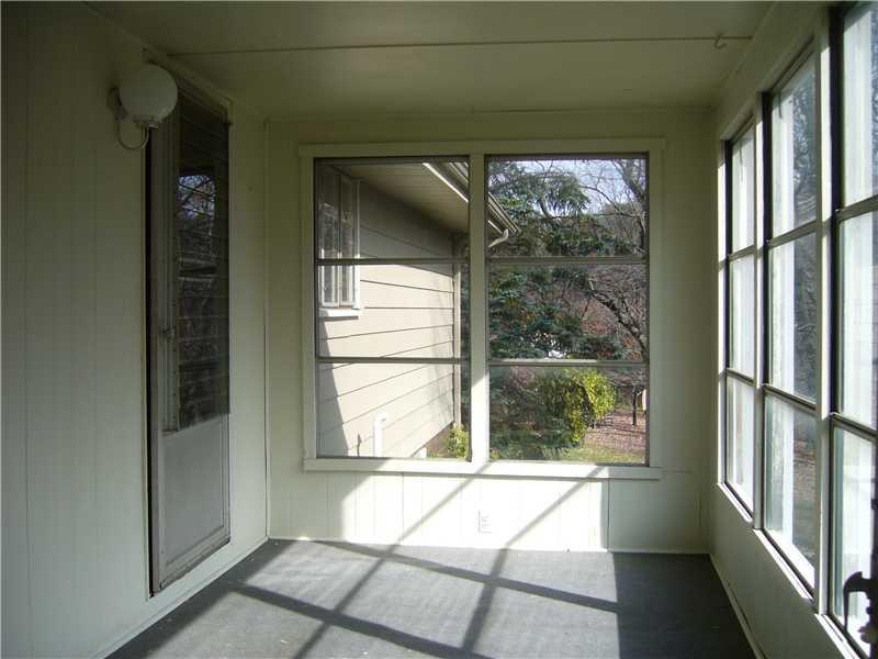 221 West Shaffer Road Aliquippa, PA 15001 - Photo 3 of 11 Sunroom. Extra entertaining area! Morning coffee?