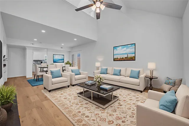 a living room with furniture or couches and a coffee table