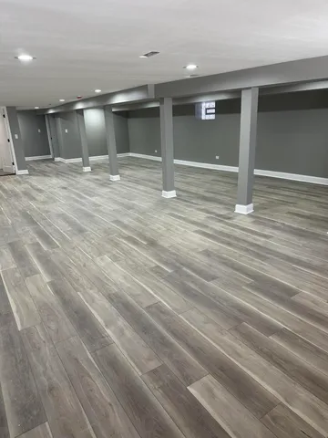 a view of a hall with an entryway