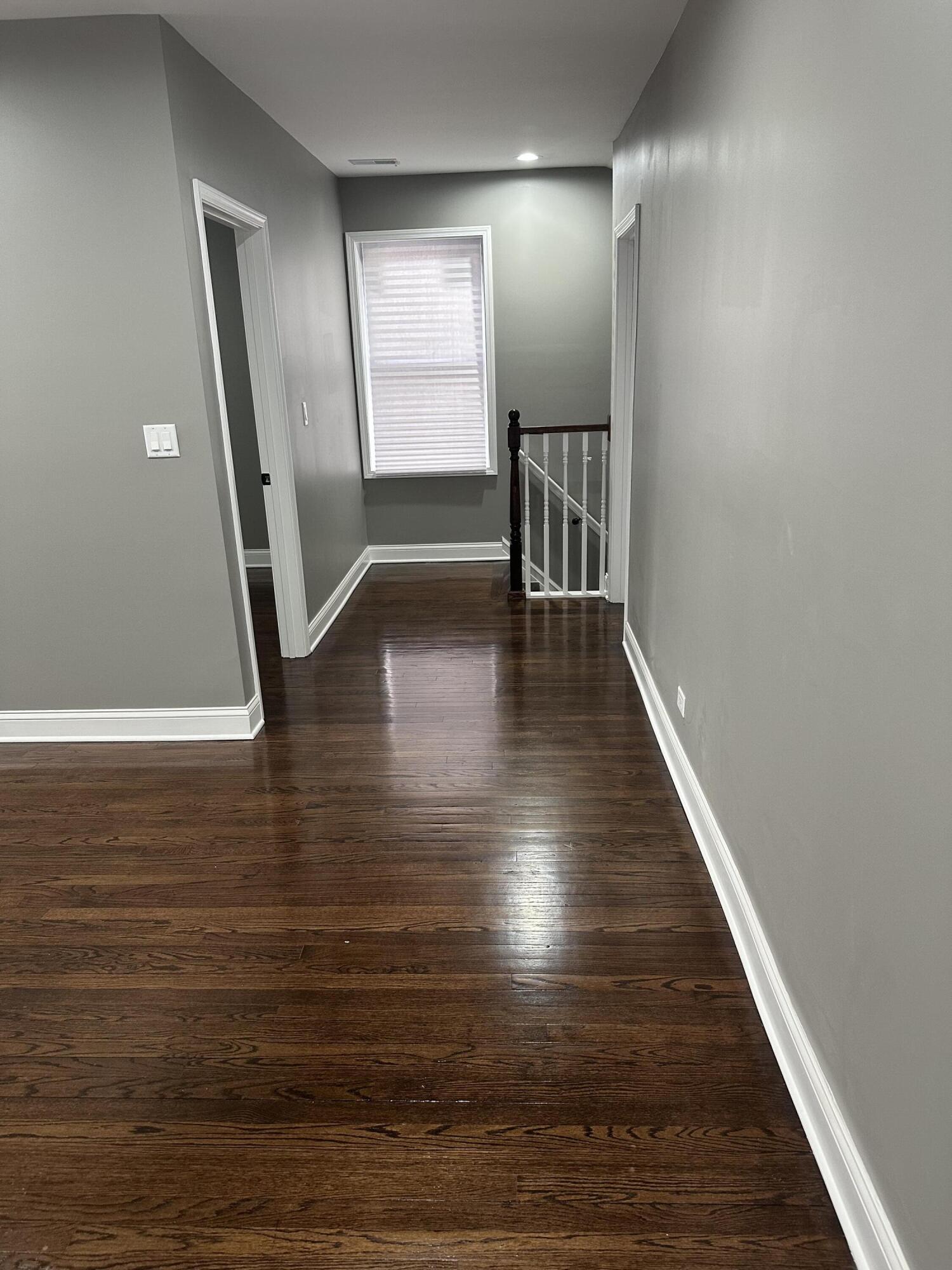 1320 Delaware Street Gary, IN 46407 - Photo 7 of 17 a view of a hallway with hardwood floor