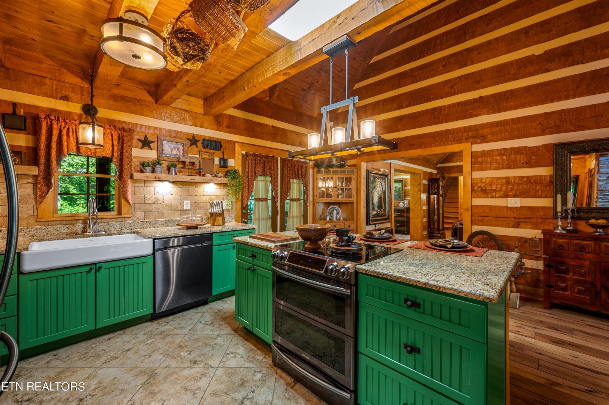 144 Lakeside Townsend, TN 37882 - Photo 15 of 56 a kitchen with a stove and a wooden cabinets