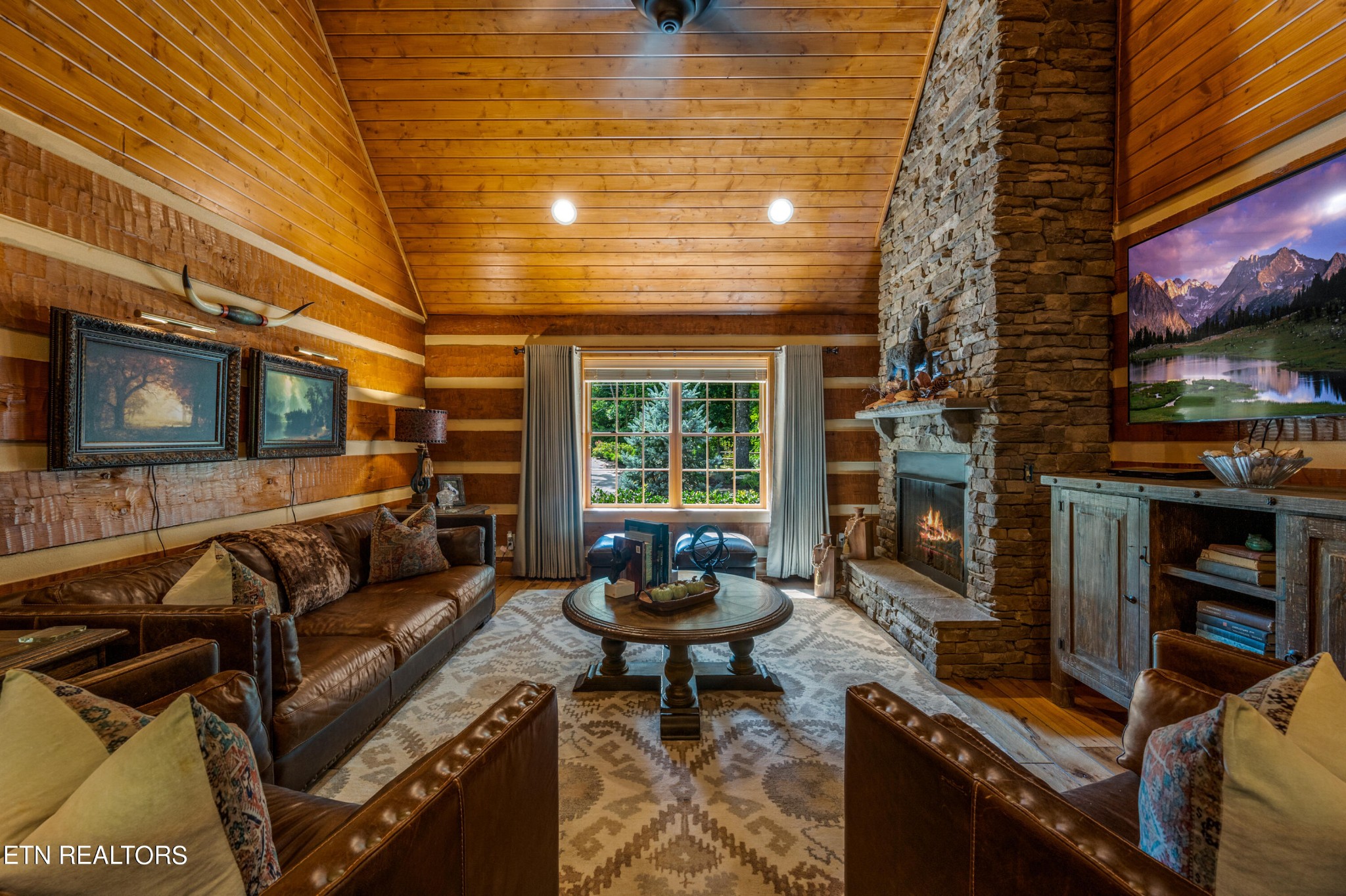 144 Lakeside Townsend, TN 37882 - Photo 20 of 56 a living room with fireplace furniture and a flat screen tv