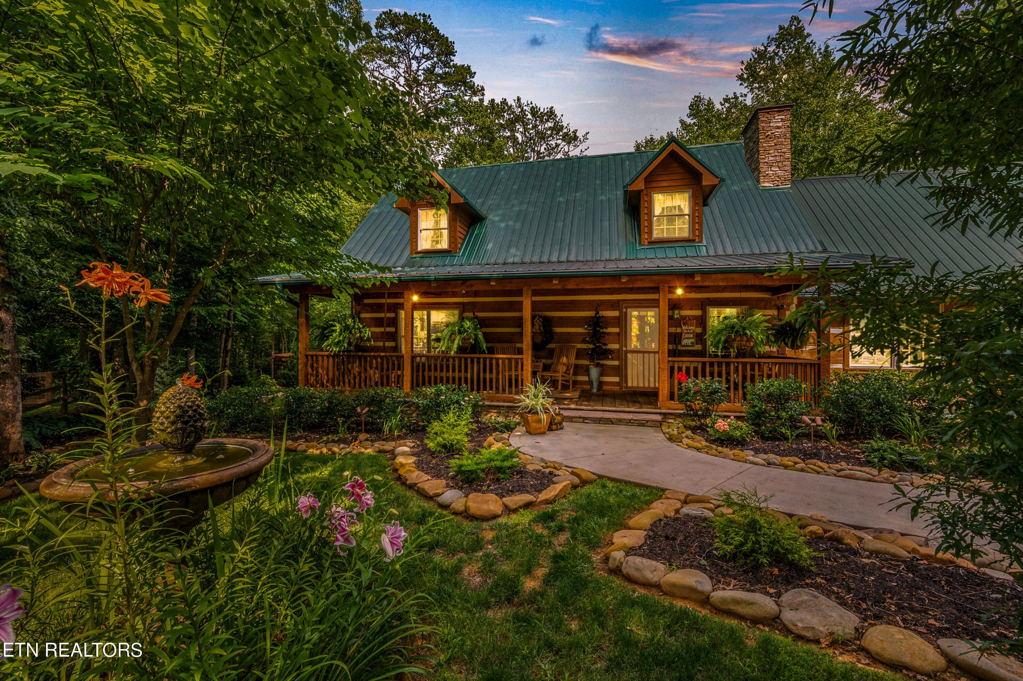 144 Lakeside Townsend, TN 37882 - Photo 2 of 56 a view of a house with yard and sitting area