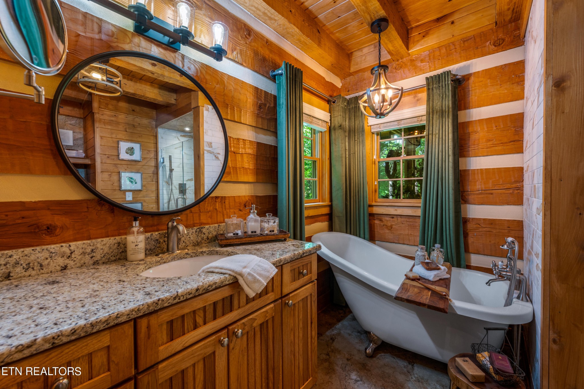 144 Lakeside Townsend, TN 37882 - Photo 30 of 56 a bathroom with a granite countertop sink and a mirror